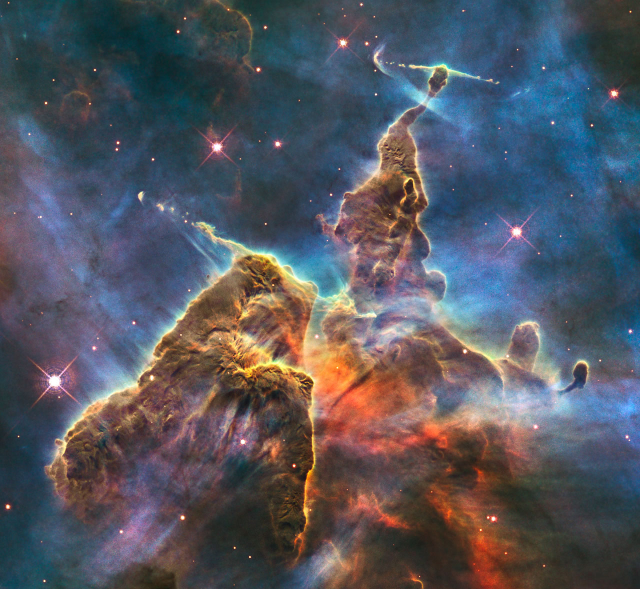 Imagen de un objeto Harbig-Haro en la Nebulosa Carina, celebra el 20 aniversario del lanzamiento del telescopio espacial Hubble. Los colores de esta imagen compuesta corresponden con el brillo del oxígeno (azul), hidrógeno y nitrógeno (verde) y azufre (rojo).